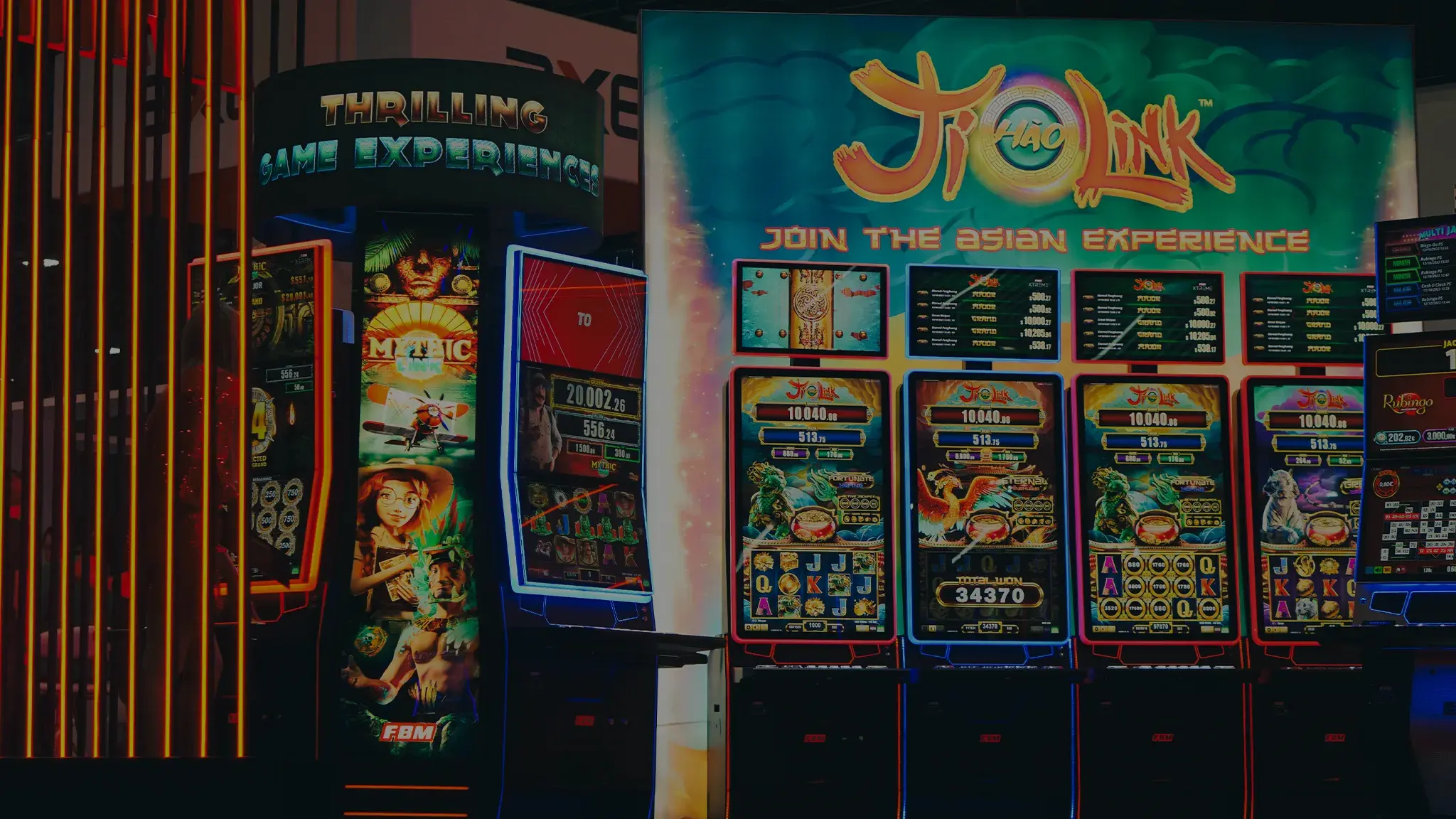Two FBM casino cabinets with slots games showcased in an international event of the casino industry