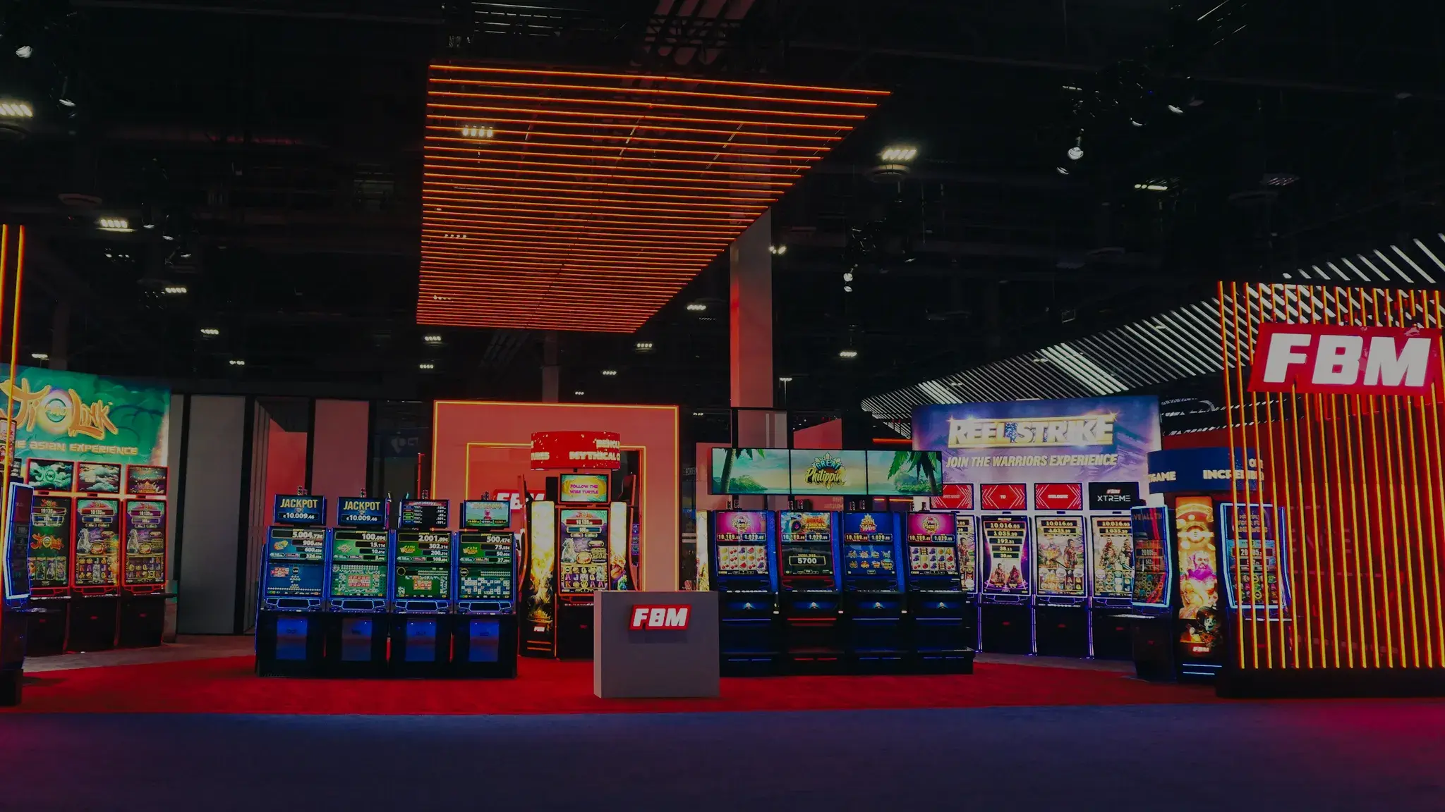 A display of FBM video bingos and slots games in an international trade show of the casino industry