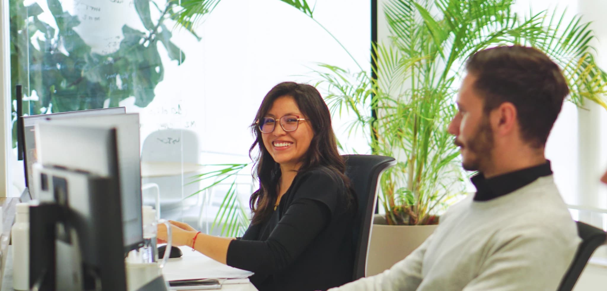 Two members of the FBM team working in the casino gaming brand office