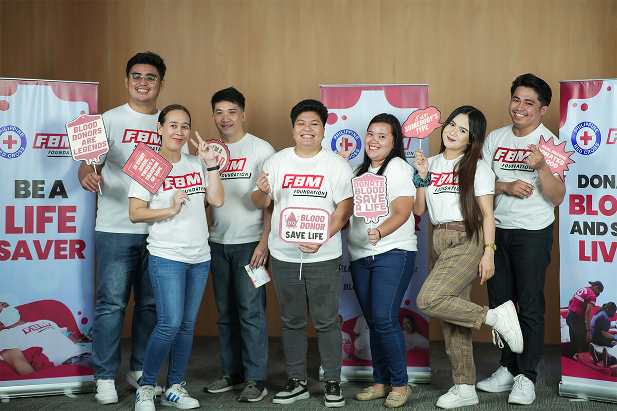 This photo shows some FBM Foundation volunteers posing after they donated blood in the blood donation initiative organized in Pasig.