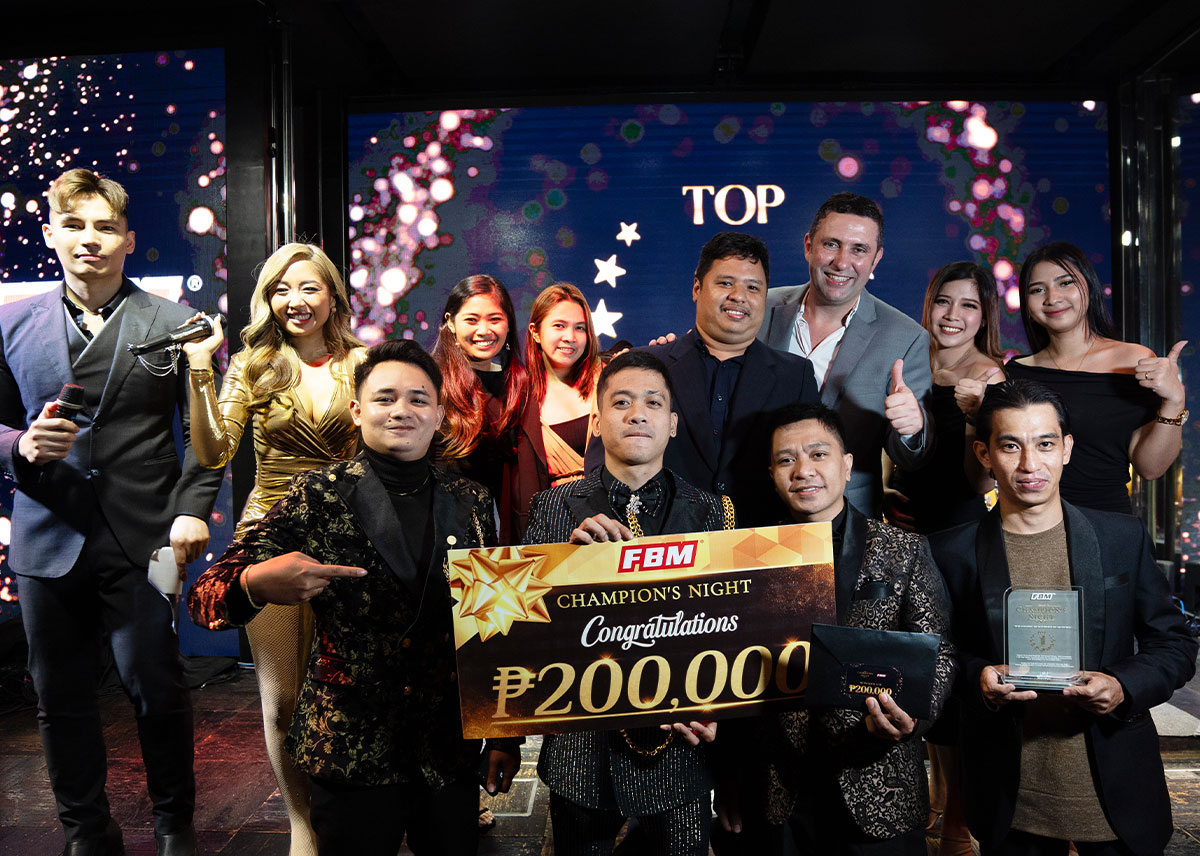 This image shows some bingo operators celebrating an award collected at FBM Champion's Night at the Grand Hyatt Hotel.