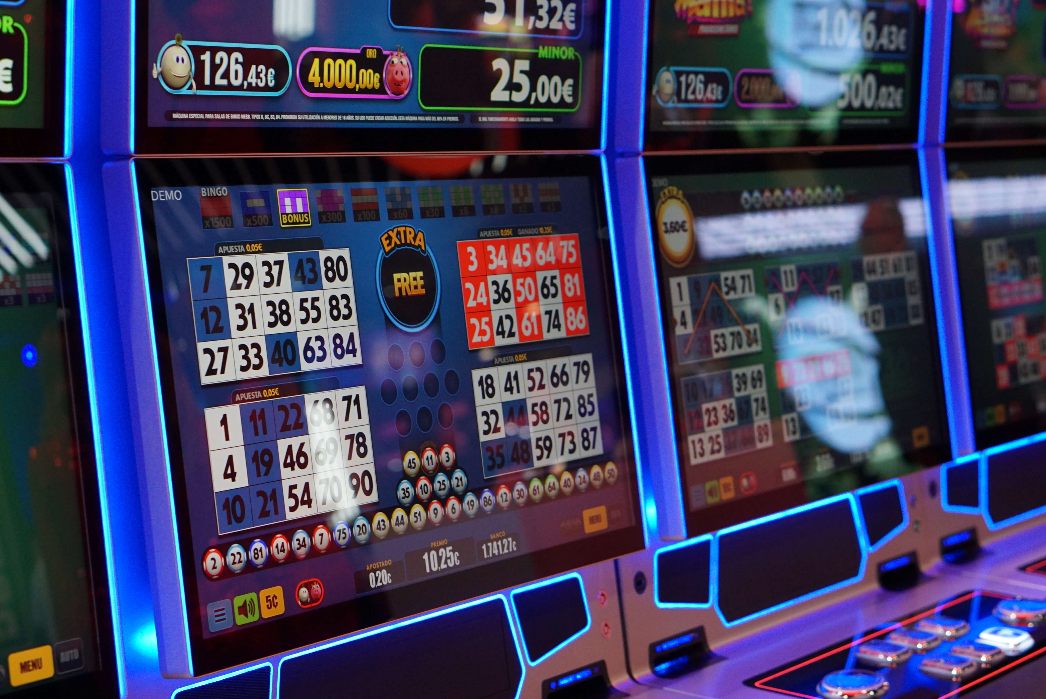 This image shows two FBM casino cabinets running video bingo games.